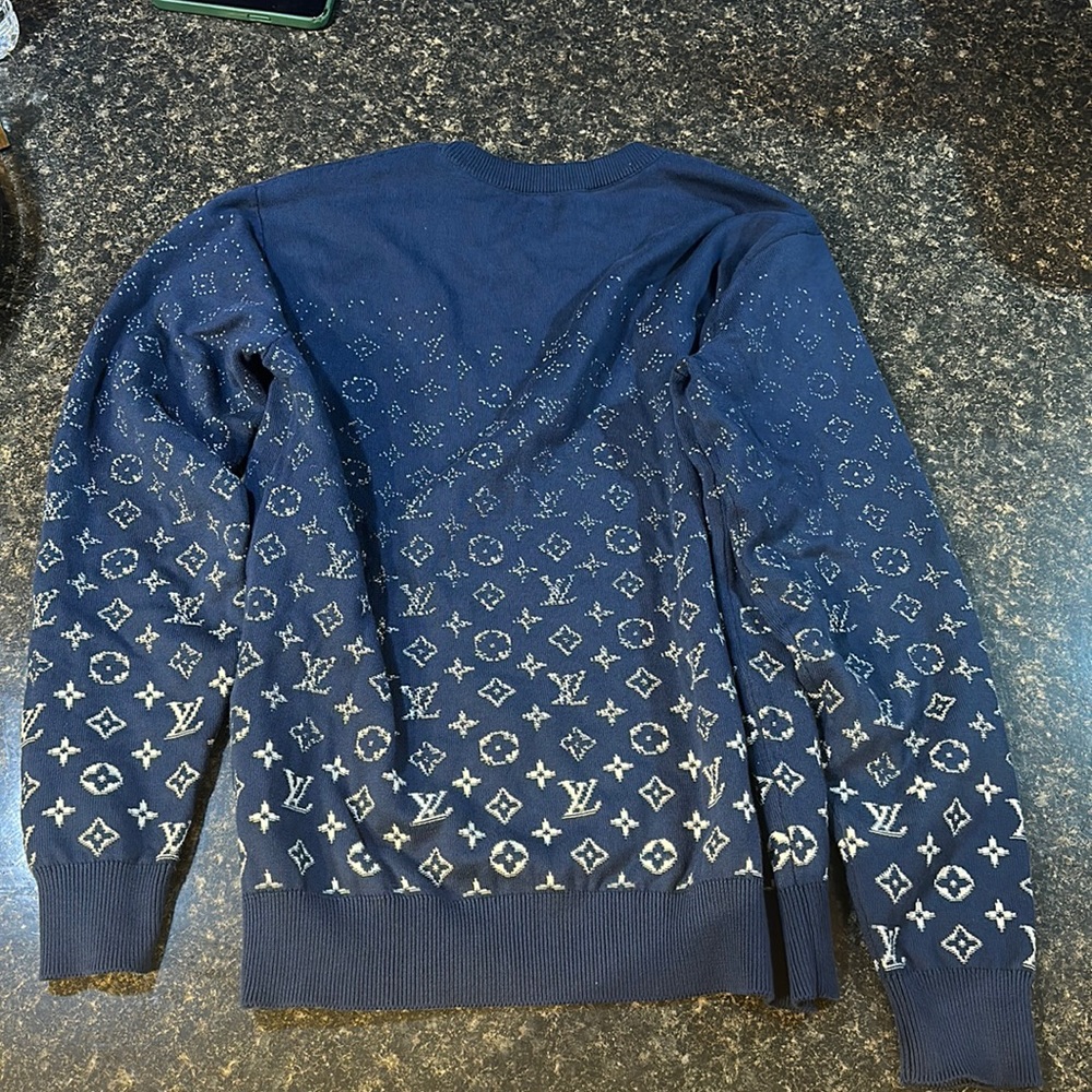 I really love this sweater but it fit small.